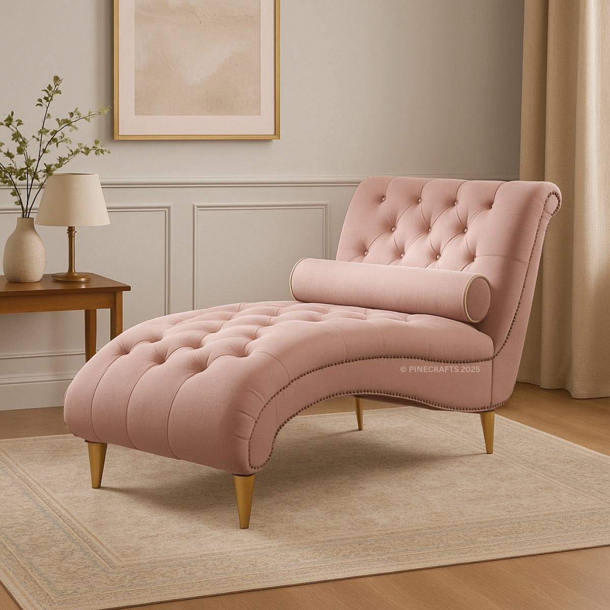 Pink tufted chaise lounge in a room with a side table and lamp.